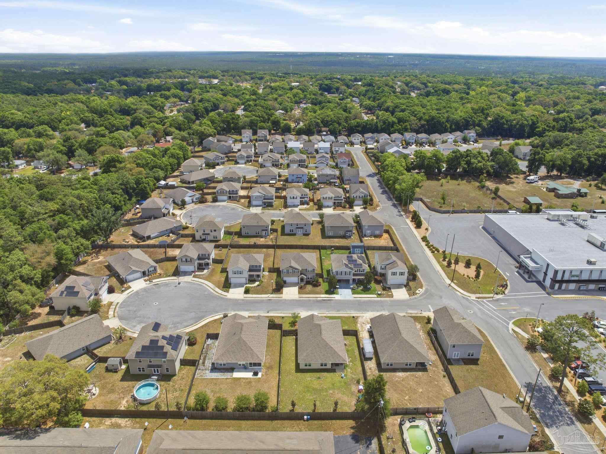 5881 Bay Tree Court Milton, FL 32570 - Photo 51 of 51 an aerial view of residential houses with outdoor space