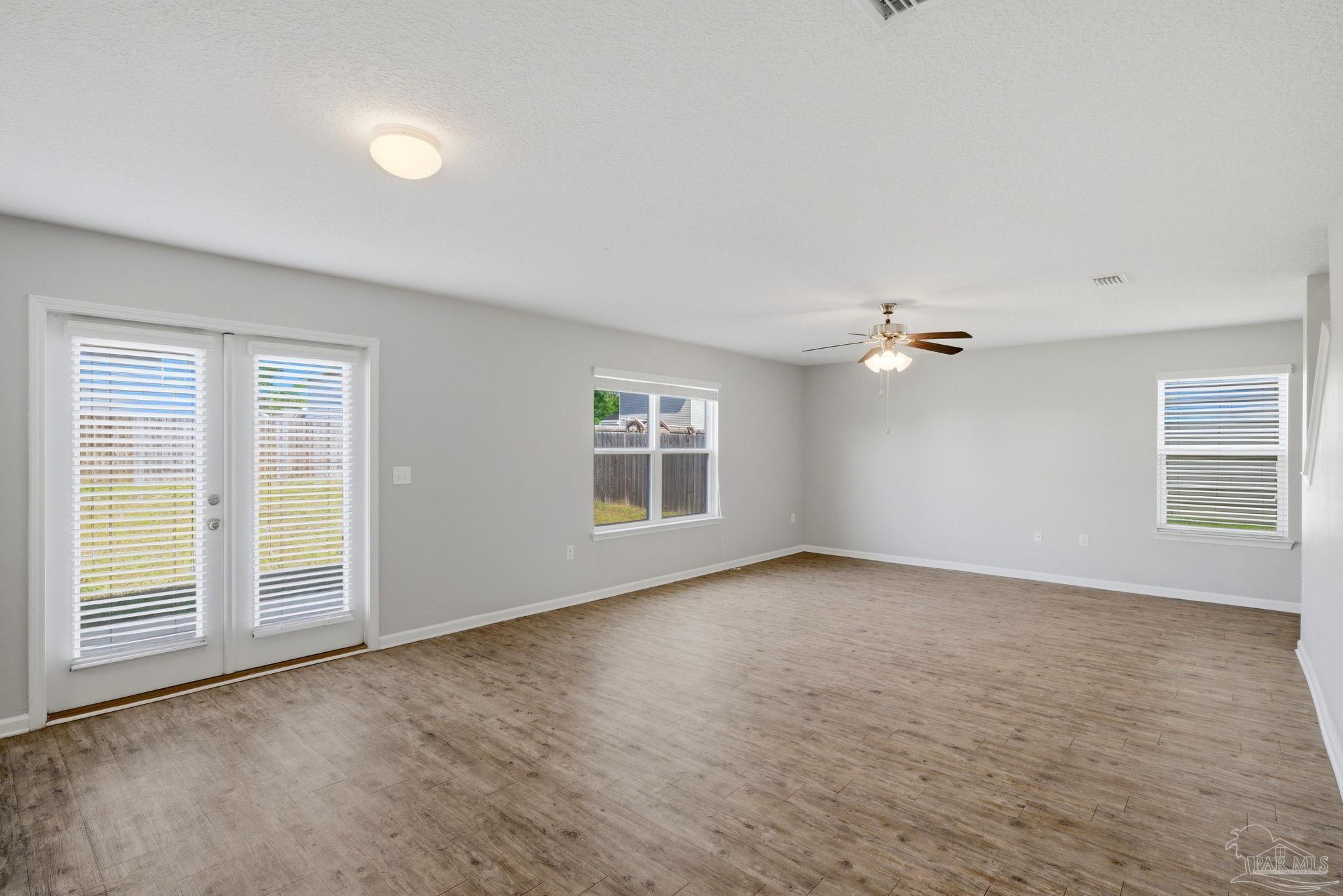 5881 Bay Tree Court Milton, FL 32570 - Photo 7 of 51 a view of an empty room with a window