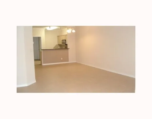 a picture of a bathroom with a shower