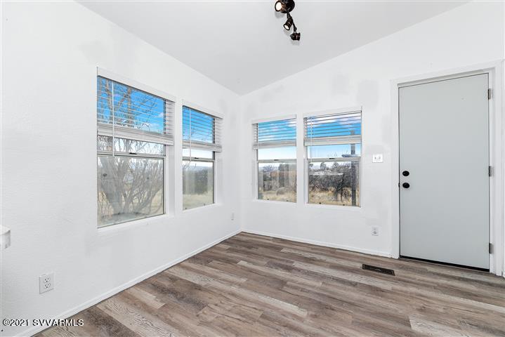 4120 East Beaver Creek Road Rimrock, AZ 86335 - Photo 14 of 31 a view of an empty room with a window