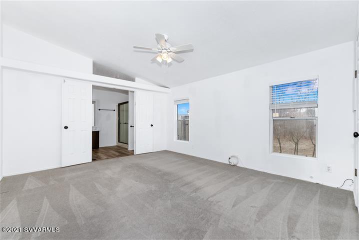 4120 East Beaver Creek Road Rimrock, AZ 86335 - Photo 16 of 31 a view of an empty room with a window