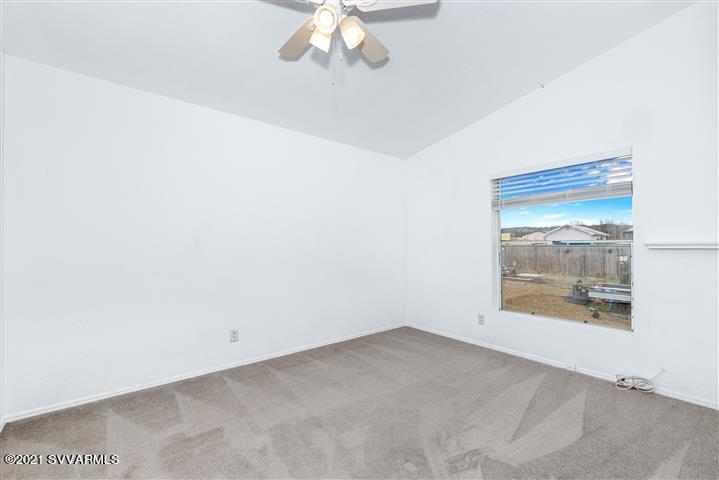 4120 East Beaver Creek Road Rimrock, AZ 86335 - Photo 24 of 31 an empty room with a fireplace