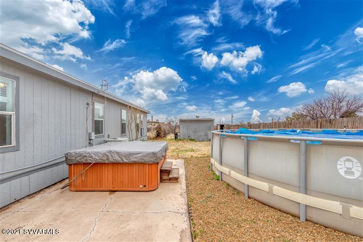 4120 East Beaver Creek Road Rimrock, AZ 86335 - Photo 27 of 31 a view of a swimming pool with a patio