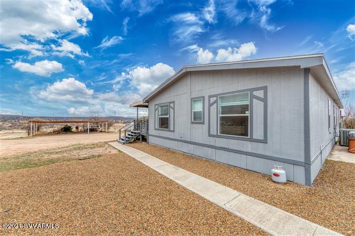 4120 East Beaver Creek Road Rimrock, AZ 86335 - Photo 29 of 31 a view of a house with a yard