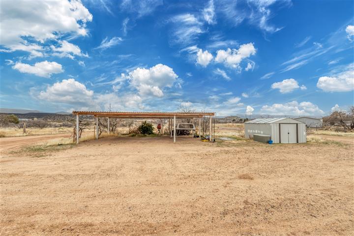 4120 East Beaver Creek Road Rimrock, AZ 86335 - Photo 4 of 31 a view of a terrace with yard