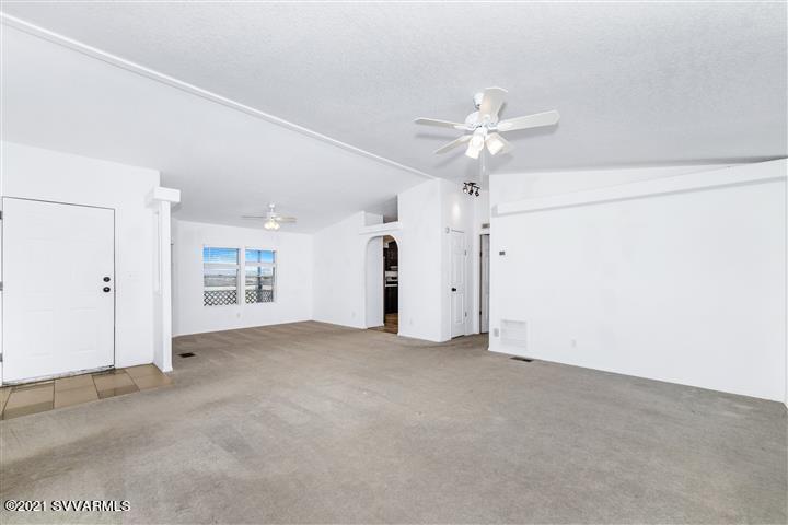 4120 East Beaver Creek Road Rimrock, AZ 86335 - Photo 5 of 31 an empty room with fan and a ceiling fan