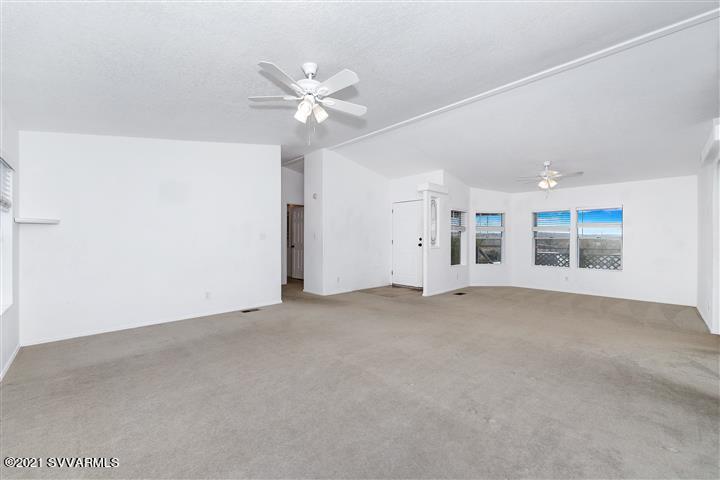 4120 East Beaver Creek Road Rimrock, AZ 86335 - Photo 8 of 31 a view of an empty room with a window