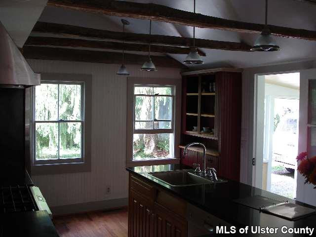 54 Pine Bush Road Stone Ridge, NY 12484 - Photo 4 of 5 a kitchen with a sink and a window