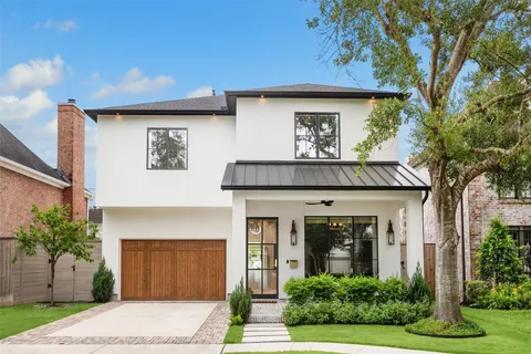 a house view with a garden space