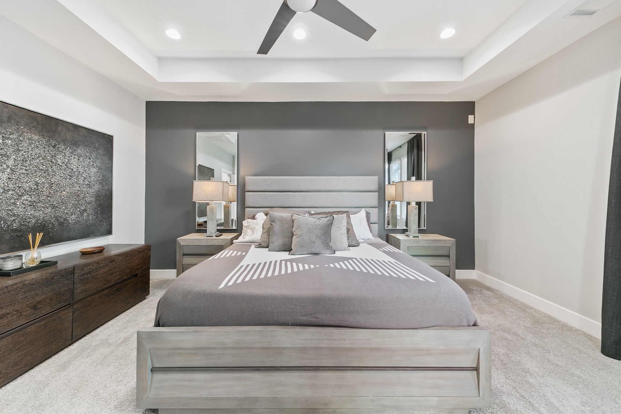4032 Buck Street, Unit A Houston, TX 77020 - Photo 25 of 39 a bedroom with a large bed and a couch