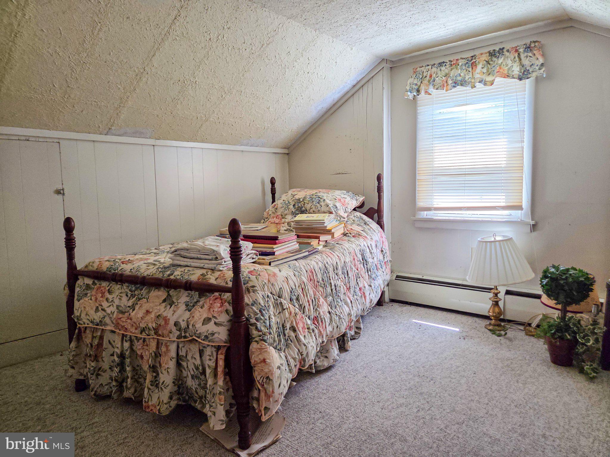 524 Locust Street Denver, PA 17517 - Photo 22 of 36 Cozy attic retreat with floral charm.
