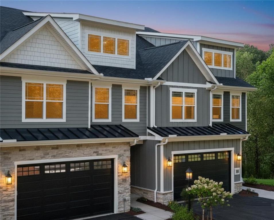 102 Bartlett Lane Wexford, PA 15090 - Photo 1 of 40 a front view of a house with a yard