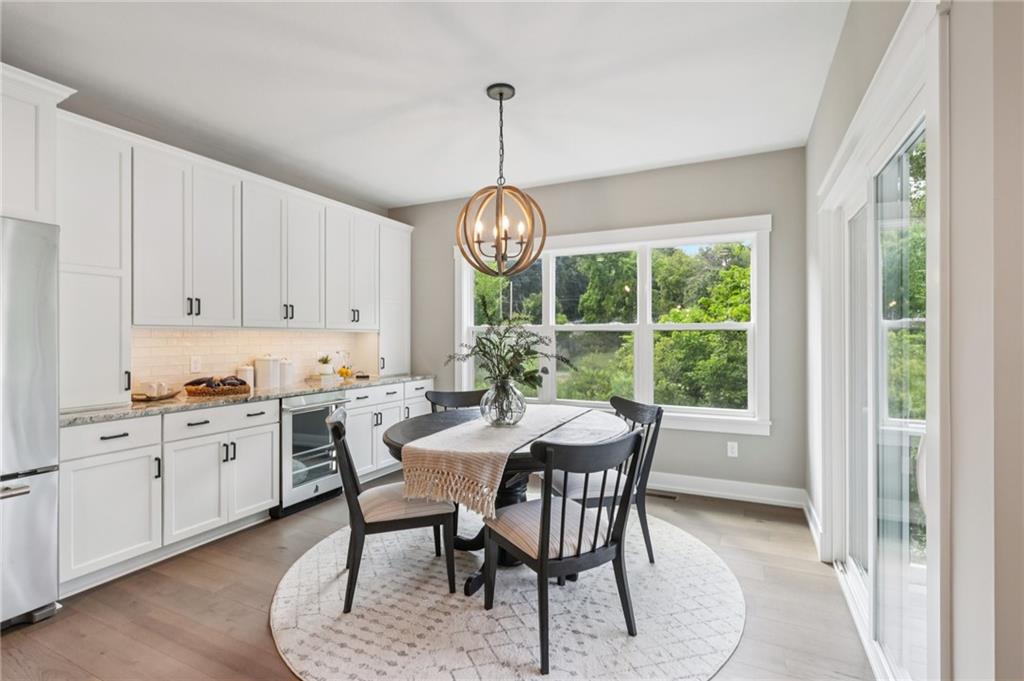 102 Bartlett Lane Wexford, PA 15090 - Photo 14 of 40 a view of a dining room with furniture window and outside view