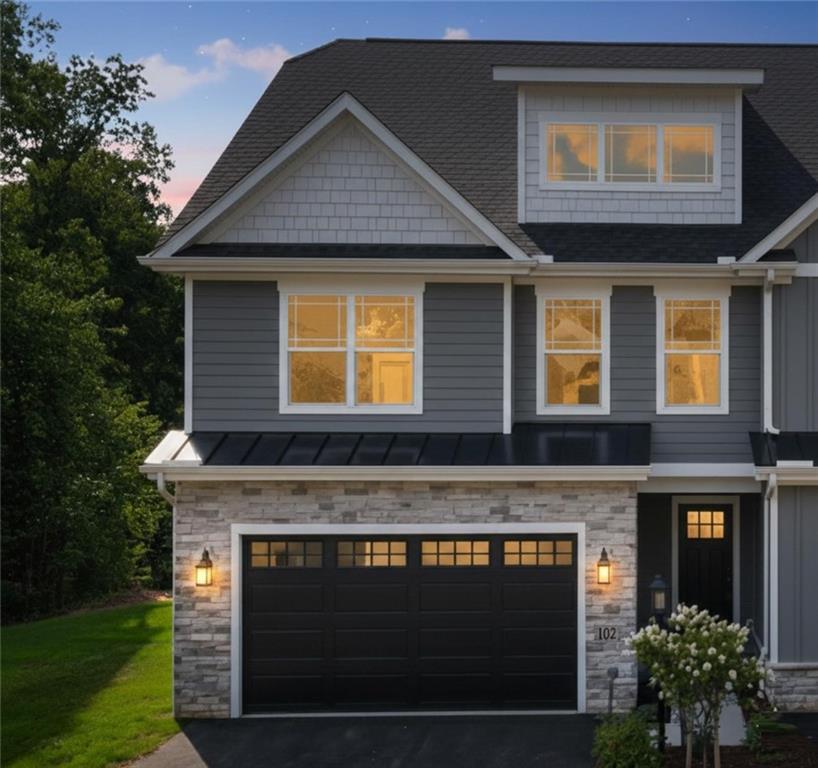 102 Bartlett Lane Wexford, PA 15090 - Photo 2 of 40 a front view of a house with garden