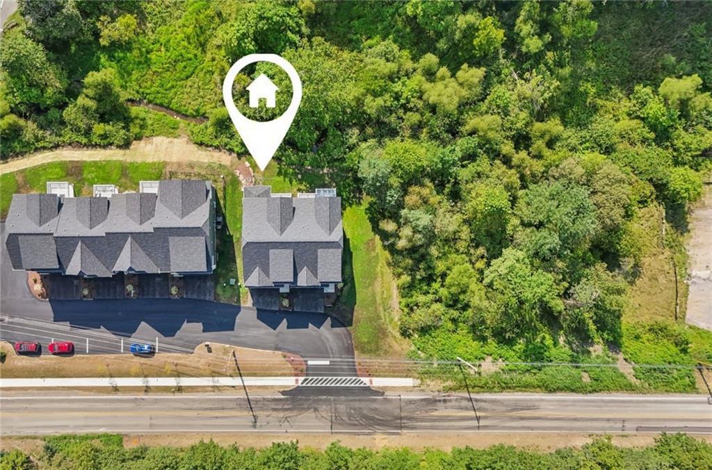 102 Bartlett Lane Wexford, PA 15090 - Photo 6 of 40 a front view of a house with garden