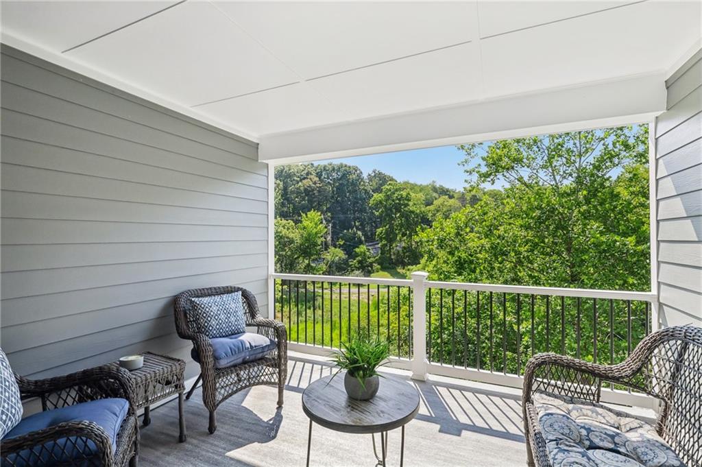 102 Bartlett Lane Wexford, PA 15090 - Photo 9 of 40 a view of a chair in wooden deck