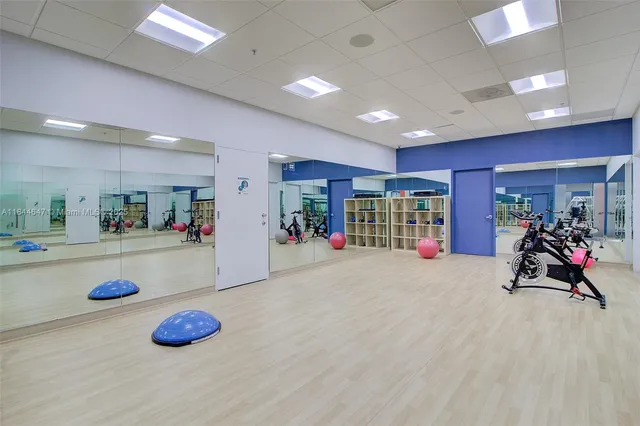 a view of a room with gym equipment