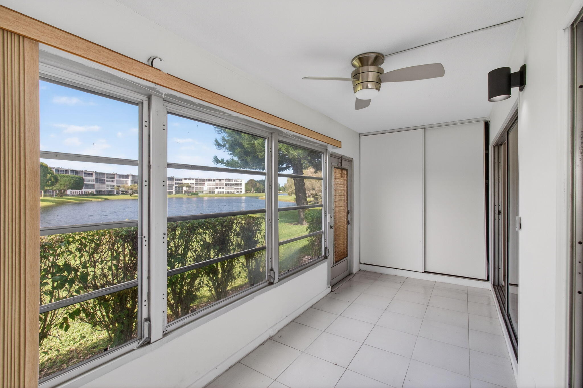 1036 Hythe B, Unit B Boca Raton, FL 33434 - Photo 27 of 53 a view of front door and porch