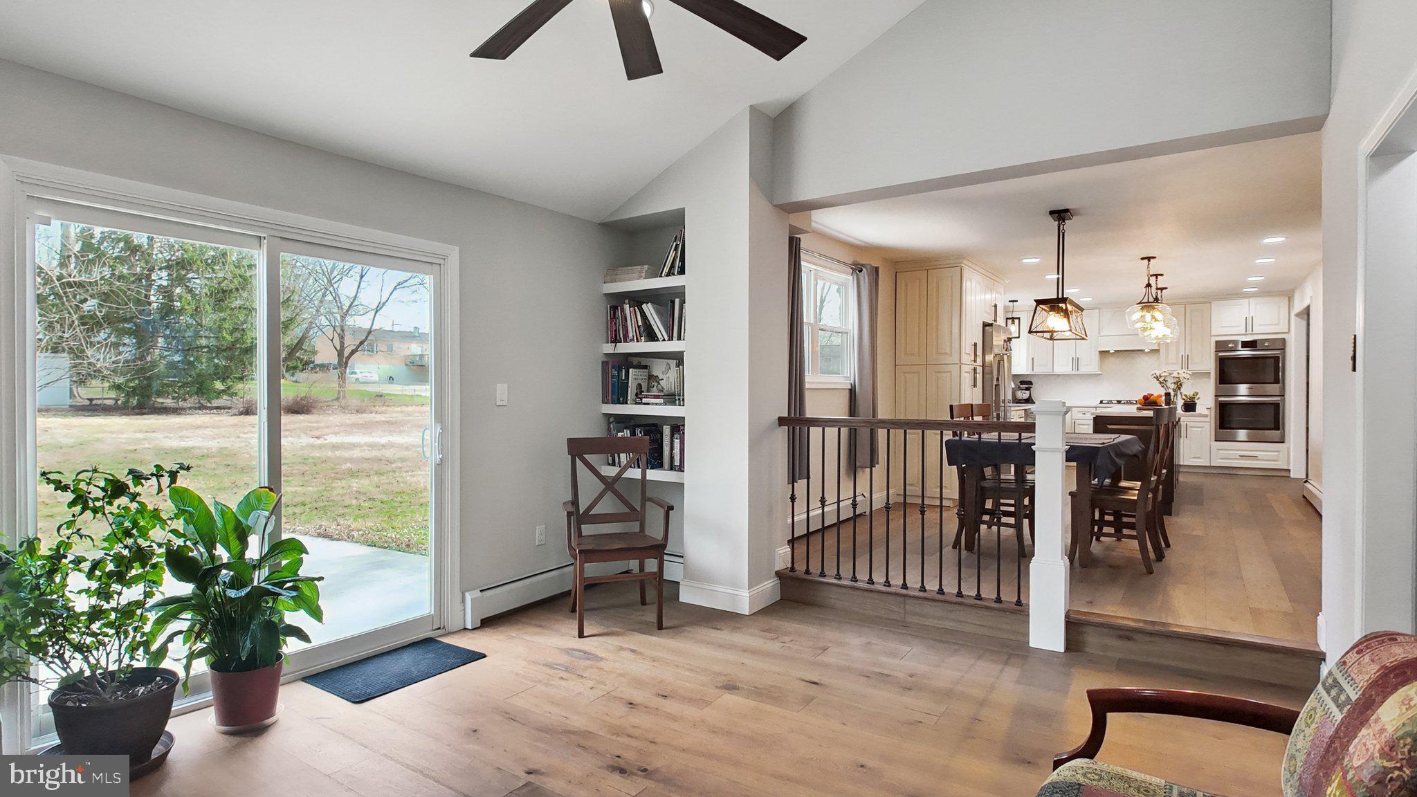 94 Sioux Road Doylestown, PA 18901 - Photo 14 of 33 a view of a livingroom with a potted plant and furniture