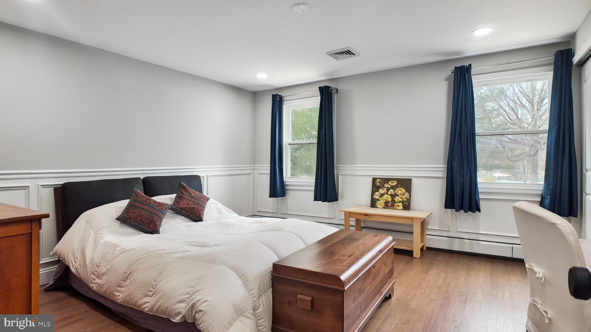 94 Sioux Road Doylestown, PA 18901 - Photo 20 of 33 a bedroom with a bed and a large window