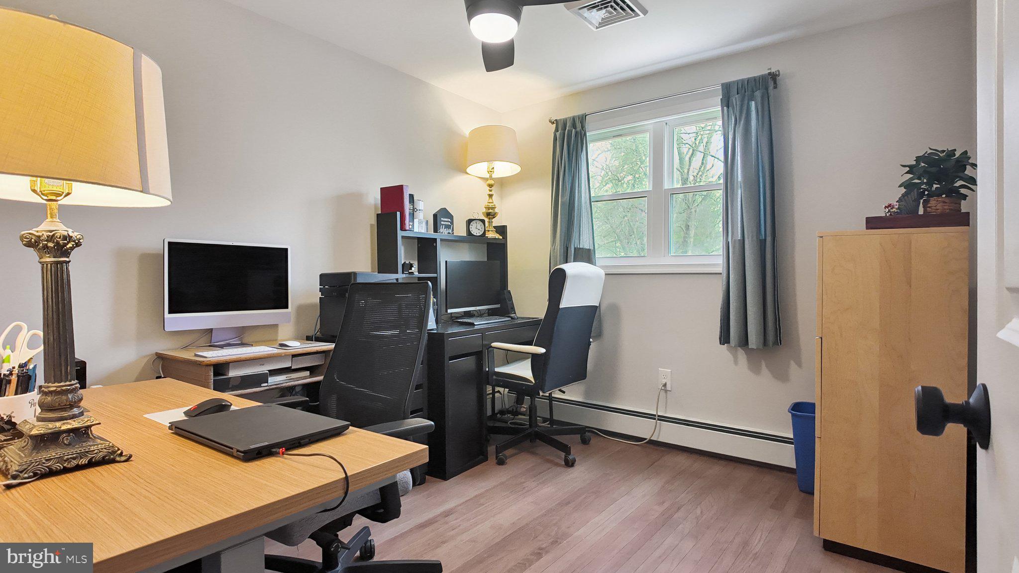 94 Sioux Road Doylestown, PA 18901 - Photo 22 of 33 a view of a workspace with furniture and a window