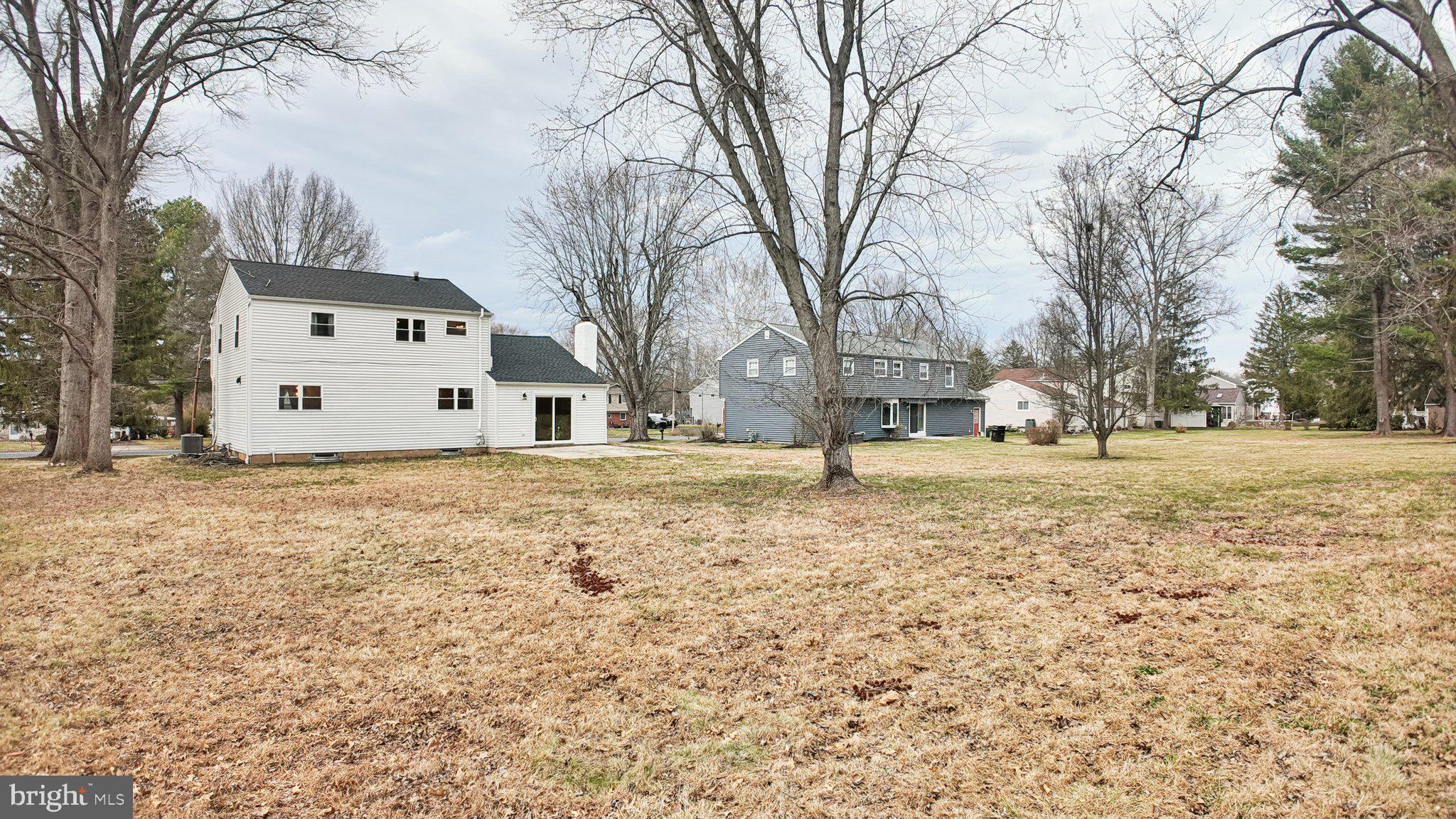 94 Sioux Road Doylestown, PA 18901 - Photo 30 of 33 a view of white house with a large tree