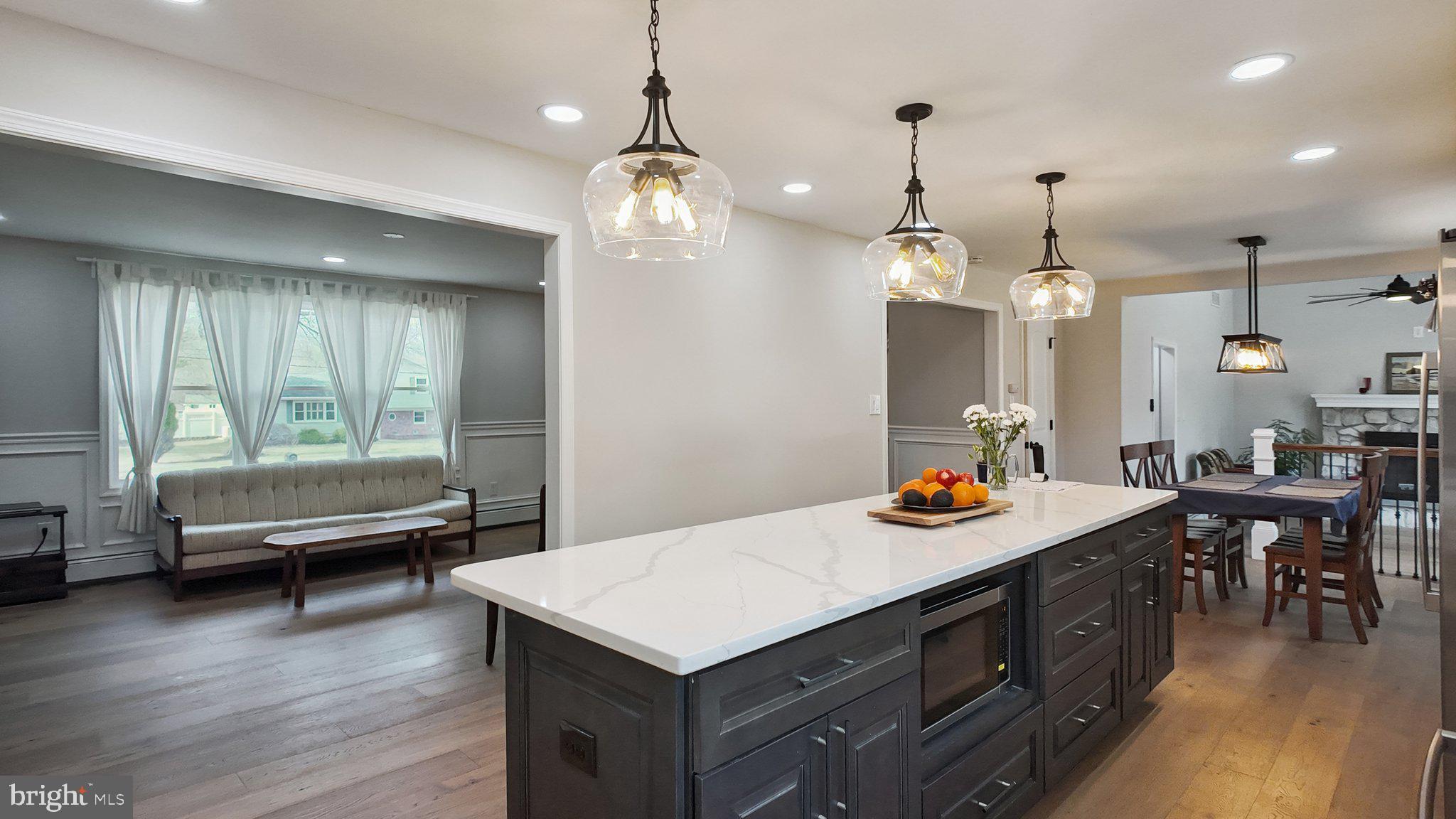 94 Sioux Road Doylestown, PA 18901 - Photo 10 of 33 a kitchen that has a table chairs and wooden floor