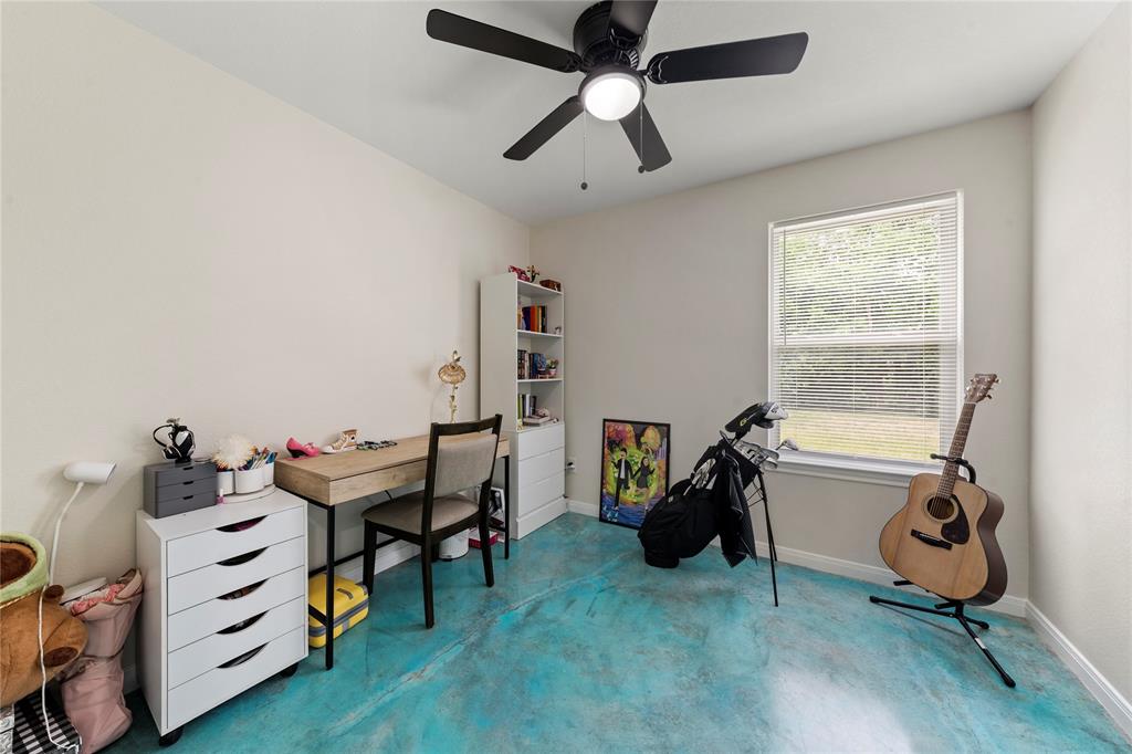 3109 North 27th Street Waco, TX 76708 - Photo 16 of 17 a living room with furniture and a window