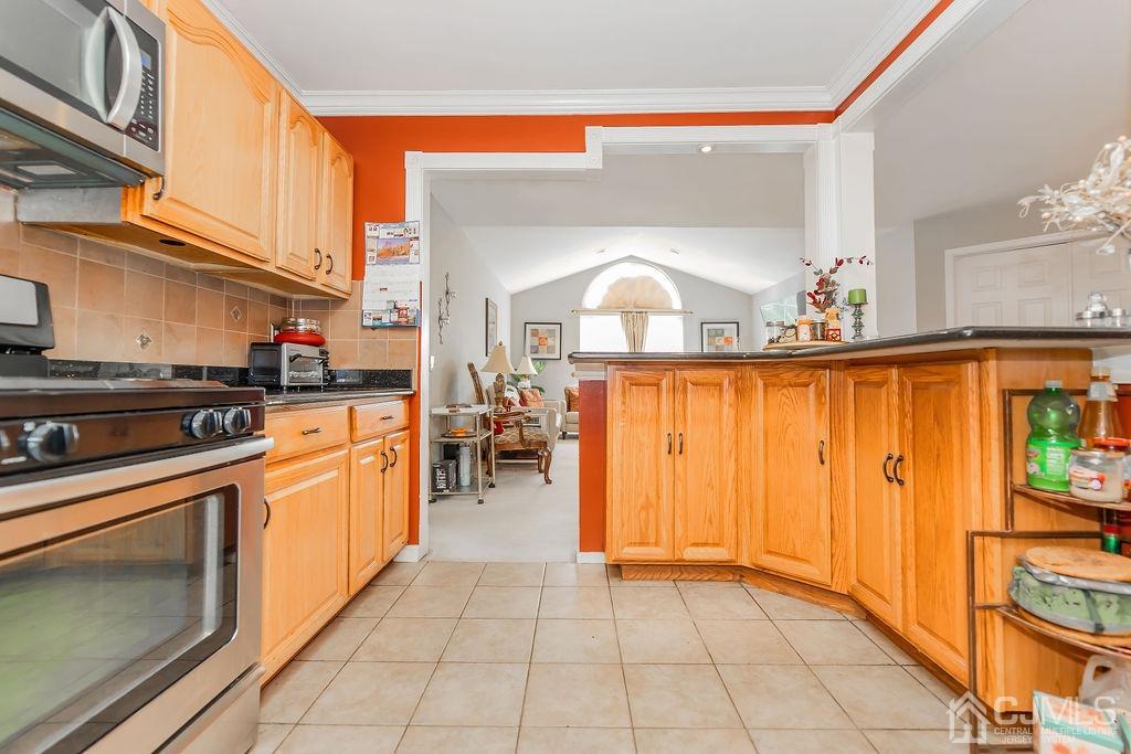 100 Genoble Road Montville, NJ 07045 - Photo 6 of 18 a kitchen with stainless steel appliances granite countertop a sink and cabinets