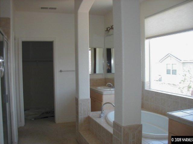 1769 Back Country Road Reno, NV 89521 - Photo 6 of 7 a bathroom with a toilet sink and tub