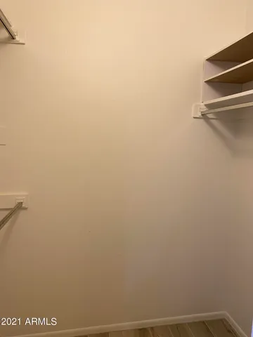 a view of small space with racks on the wall