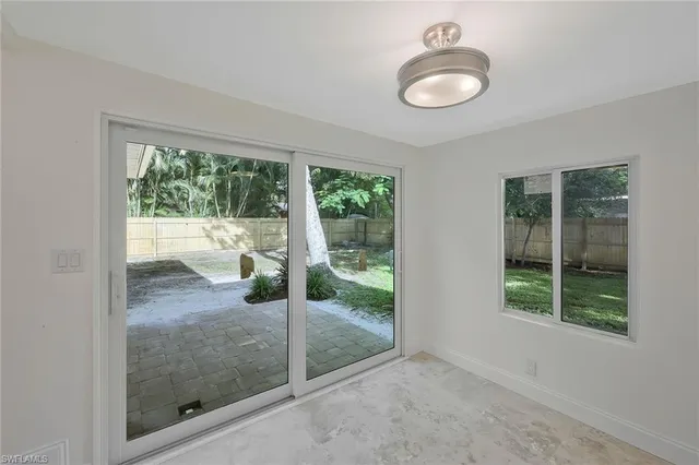 a view of a glass door and porch