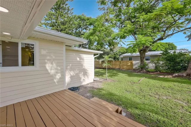 a view of backyard with green space