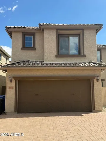 a house view with a backyard space