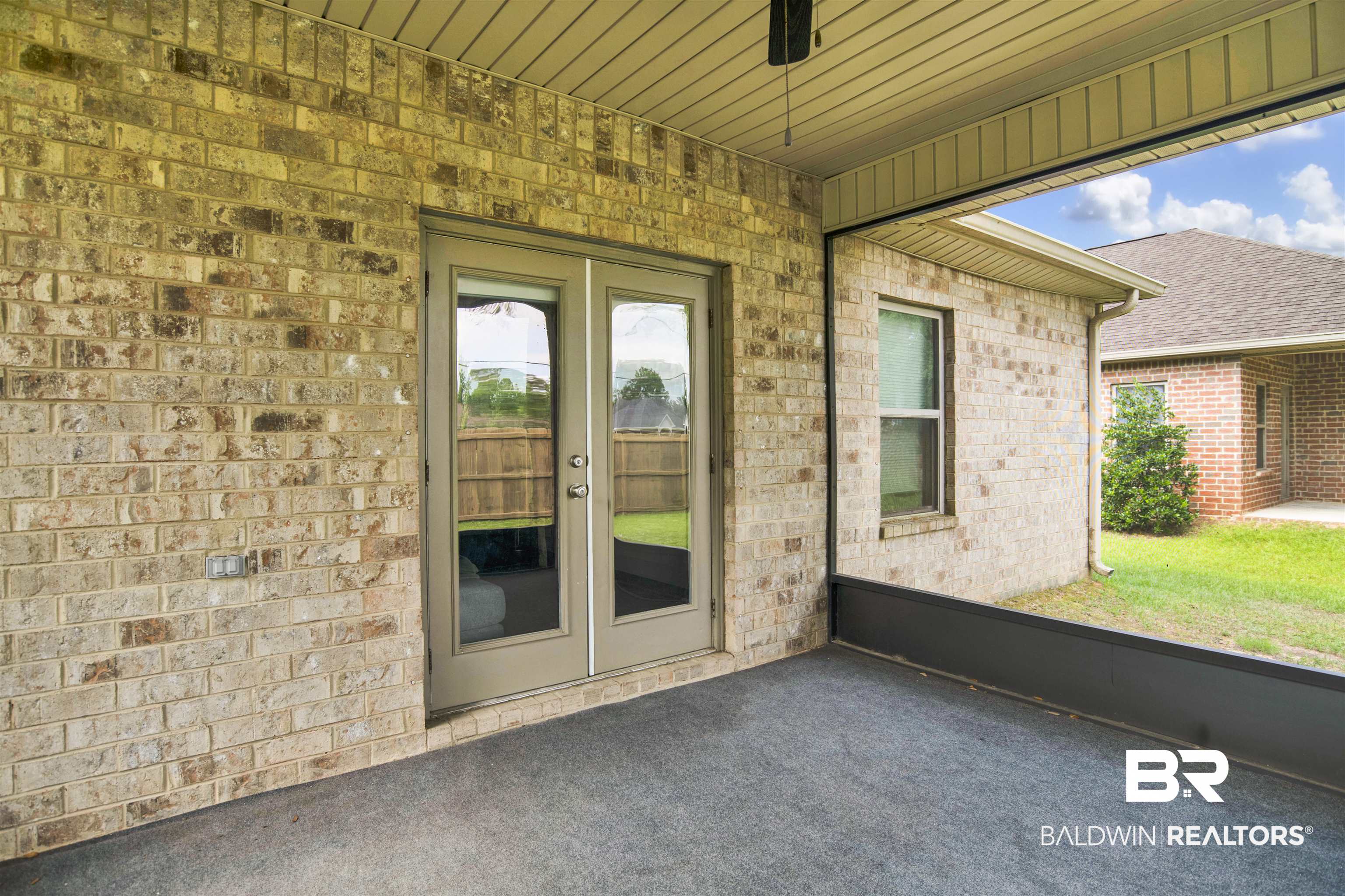 1468 Surrey Loop Foley, AL 36535 - Photo 24 of 28 Doorway to property featuring brick siding and french doors
