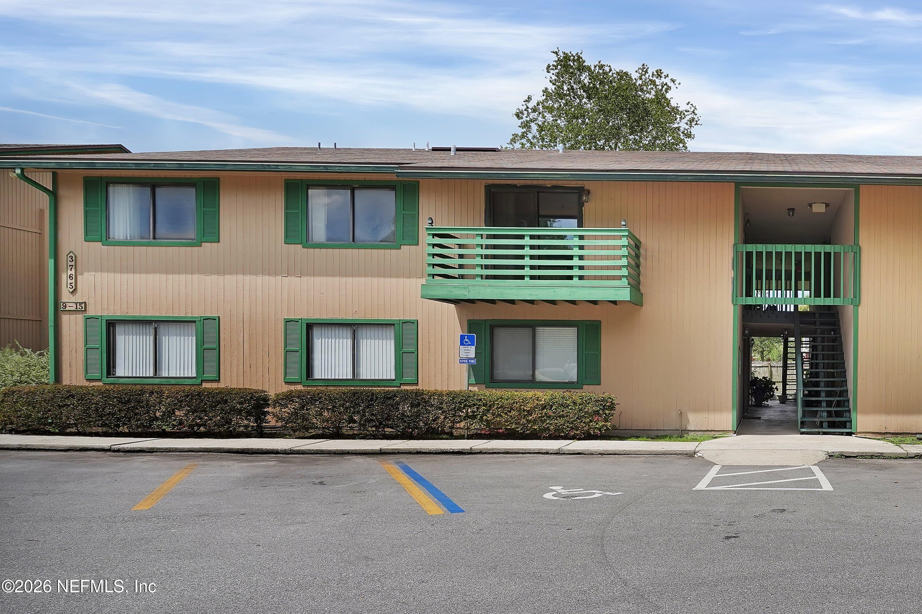 3765 Crown Point Road, Unit 13 Jacksonville, FL 32257 - Photo 1 of 37 front view of a house with a yard