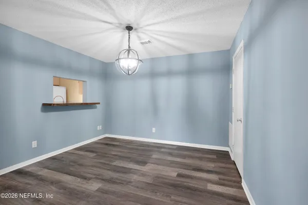 a bathroom with a sink mirror toilet and bathtub