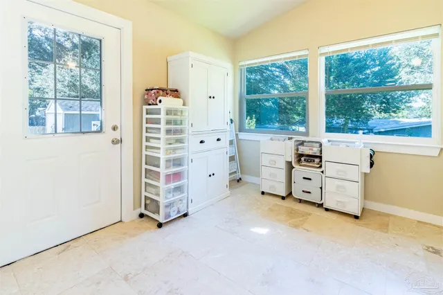 a room with furniture and window