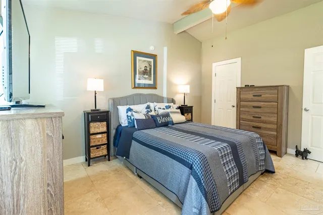 a bedroom with a bed and a cabinets