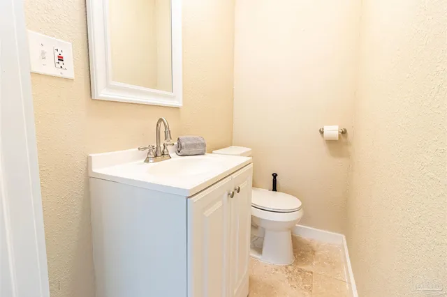 a bathroom with a sink and a toilet