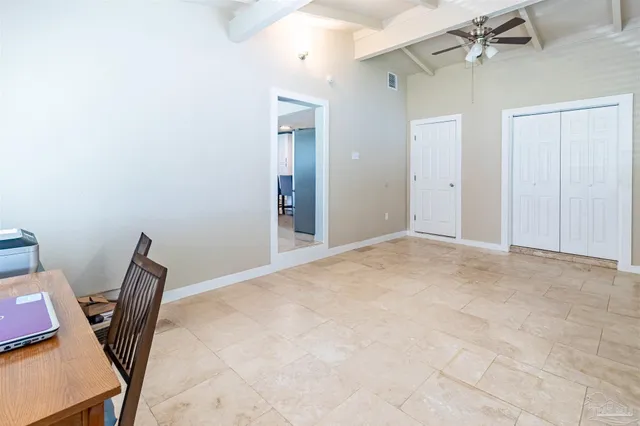 a view of a workspace with furniture