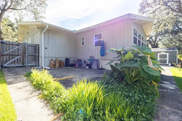 a view of a swimming pool with a patio