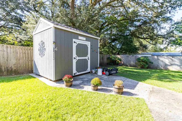 a backyard of a house with seating space