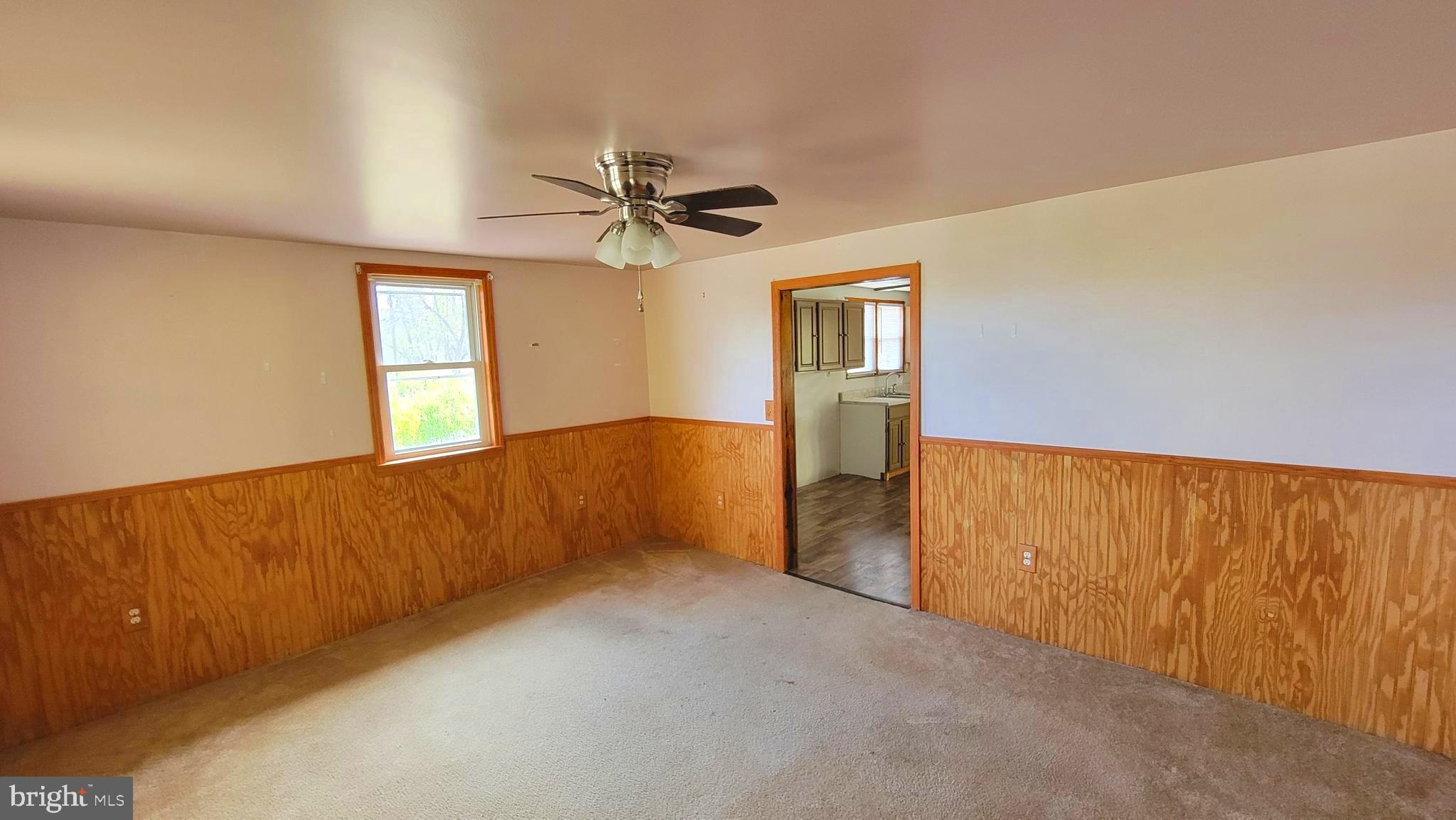 12809 Walsh Road Mount Savage, MD 21545 - Photo 20 of 30 a view of an empty room with a window