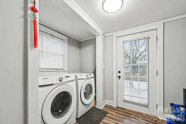 a view of balcony with wooden floor and outdoor seating