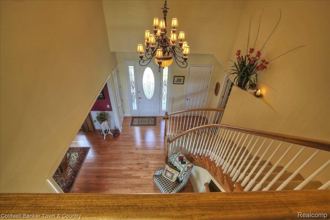 5989 Nottingham Pointe Brighton, MI 48116 - Photo 19 of 24 Staircase