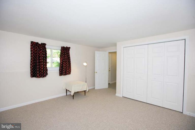 1801 Briggs Road Silver Spring, MD 20906 - Photo 14 of 30 a view of a room with window and cabinet