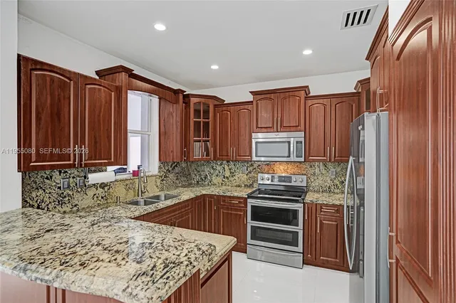 $649,000 | 7952 Northwest 198th Street, Hialeah, FL 33015