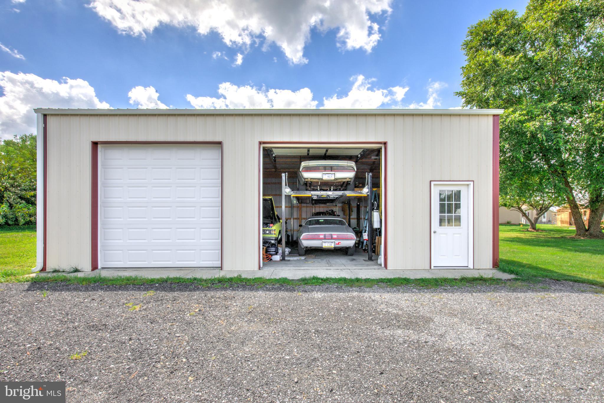 204 Roneys Corner Road Oxford, PA 19363 - Photo 28 of 33 a view of a house with a yard and garage