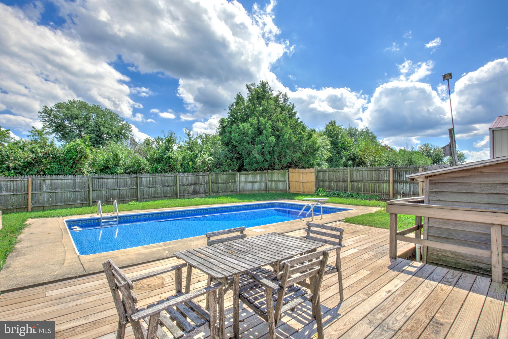 204 Roneys Corner Road Oxford, PA 19363 - Photo 30 of 33 a view of a backyard with a wooden deck and furniture